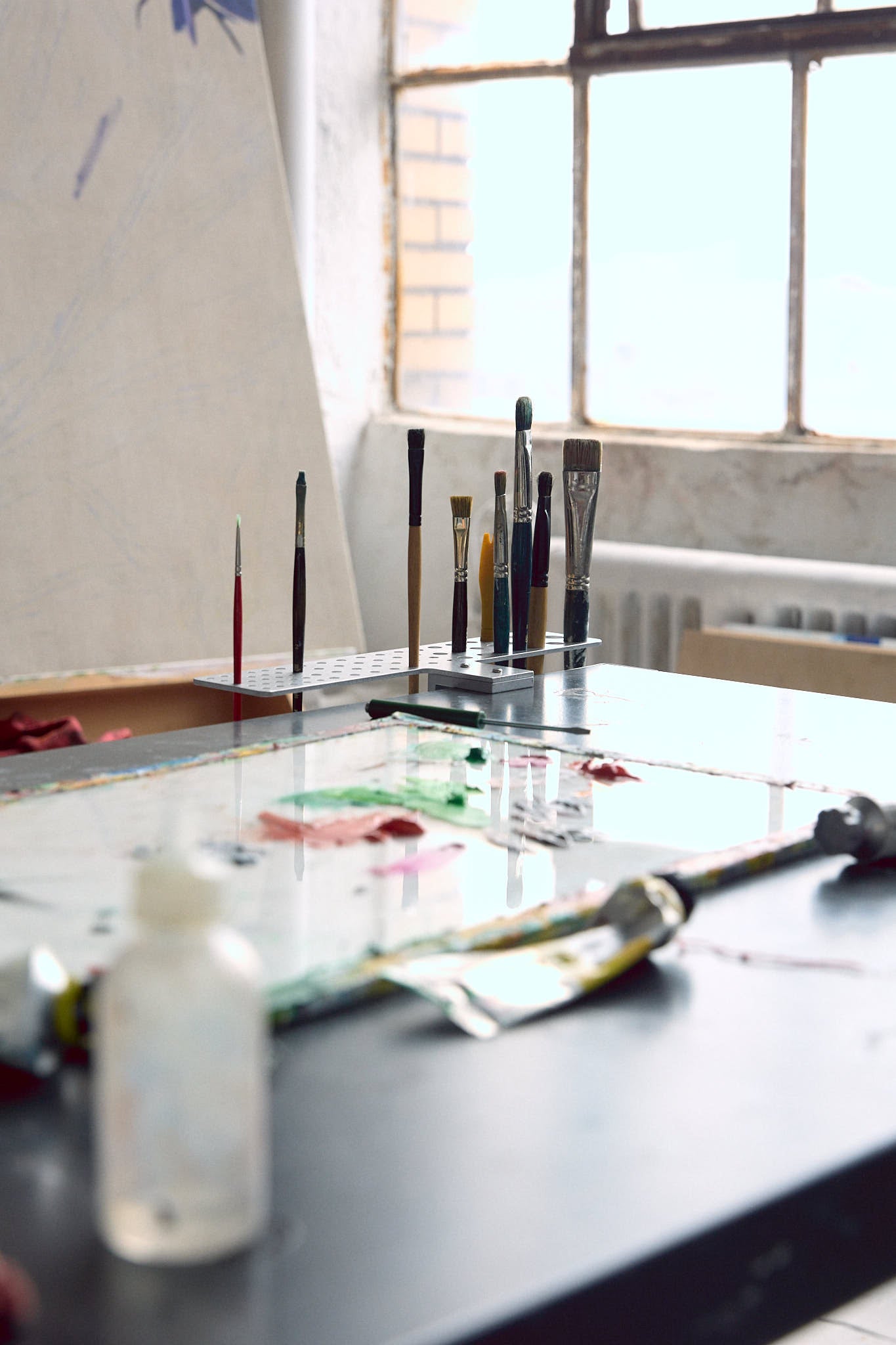paintbrush holder in an artist studio